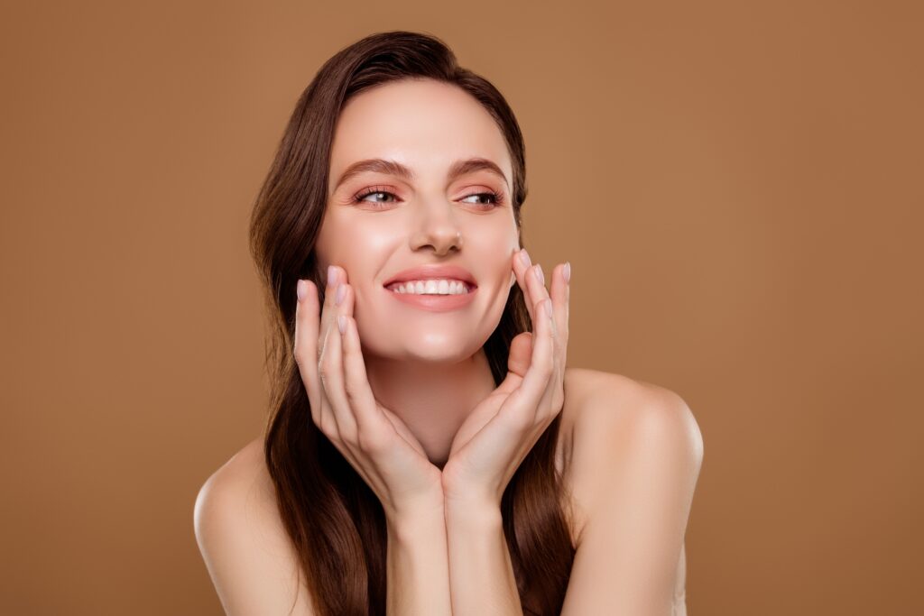 Photo,Of,Happy,Attractive,Lady,Touch,Cheeks,Wash,Face,Applying Skin Treatments Sugar Land TX