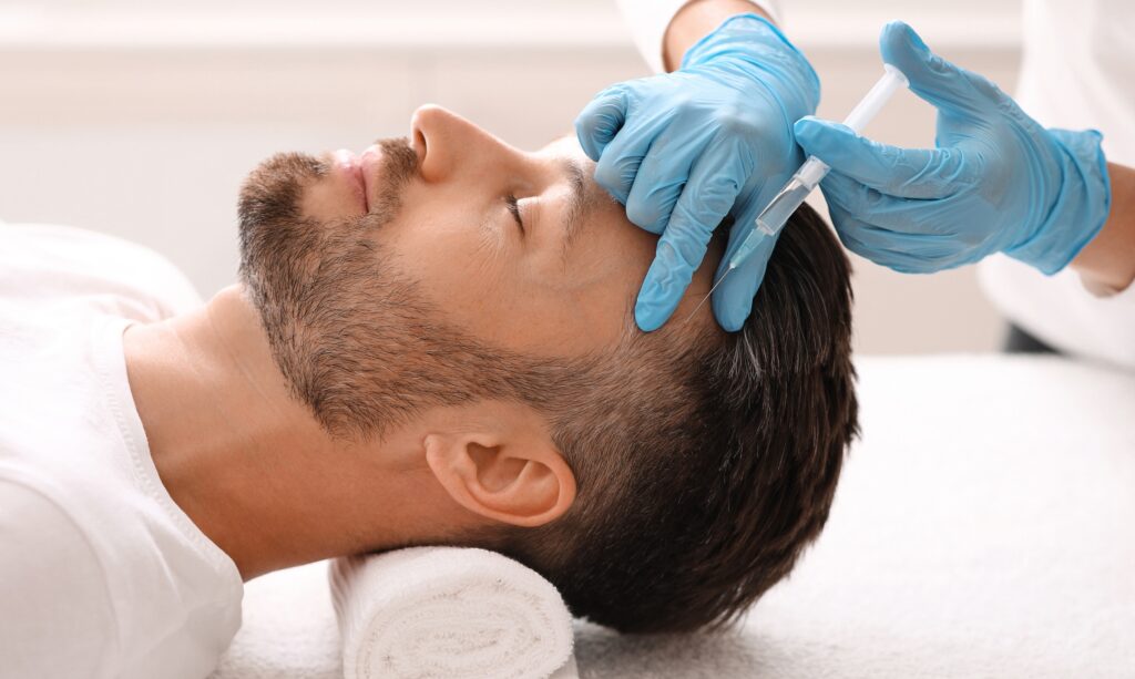Side,View,Of,Handsome,Middle,Aged,Man,Getting,Hair,Treatment PRP Injections Sugar Land TX